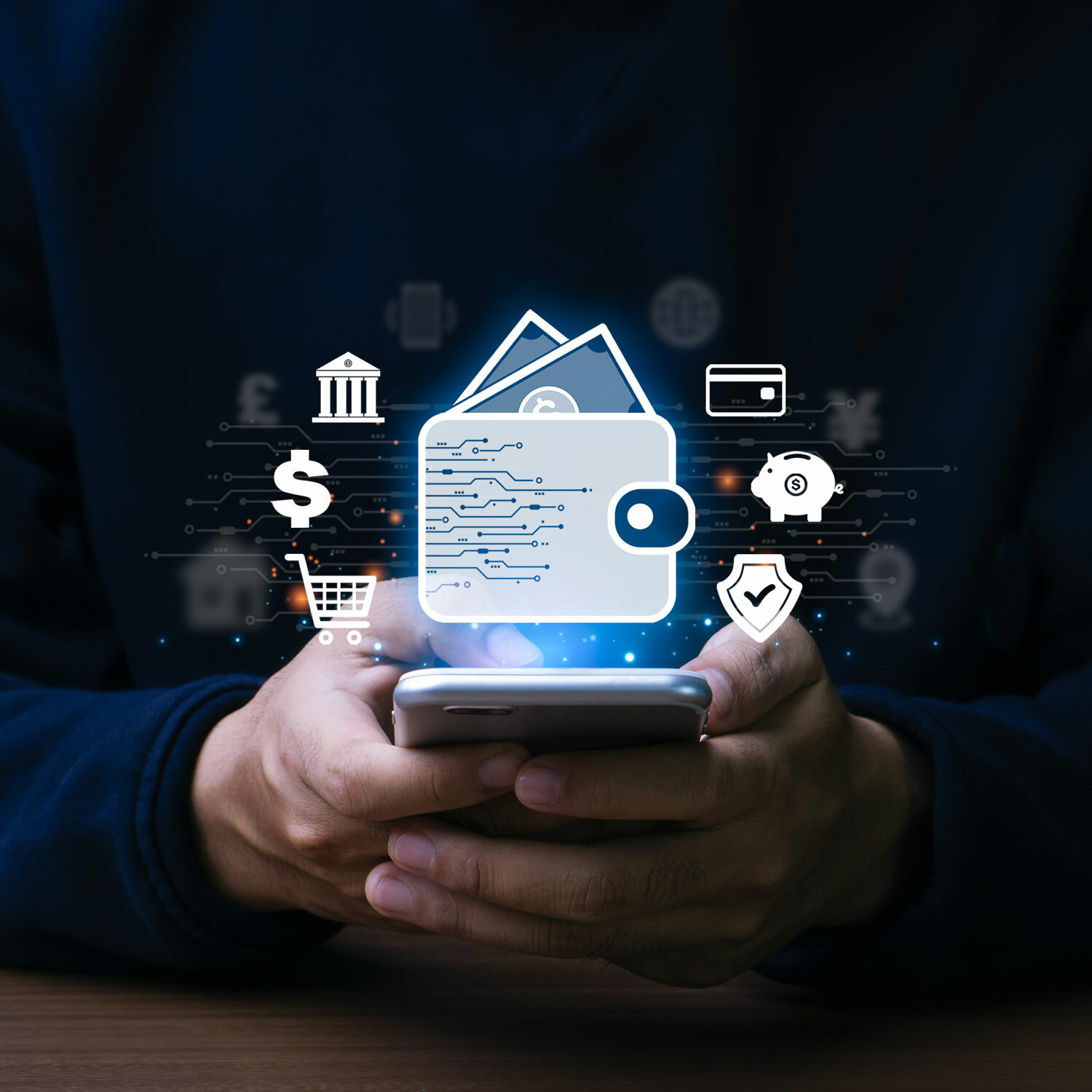 Hands holding mobile phone with dollar sign, piggy bank, and other credit union related icons 